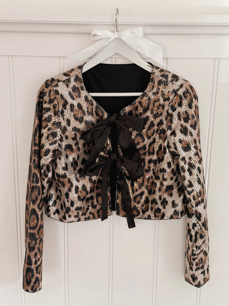 Leo Glitter Bow Blouse