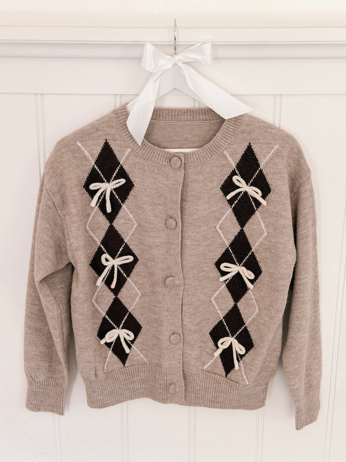 The Café Bow Cardigan